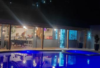 Pousada Recanto da Cascata has rooms with a private hot tub