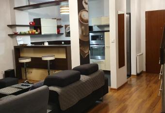 Apartament Kordiana (Sauna & Jacuzzi) has rooms with a private hot tub