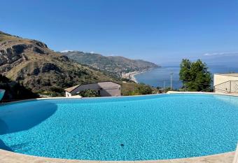 LUXURY APARTMENT TAORMINA WITH POOL AND PARKING has rooms with a private hot tub