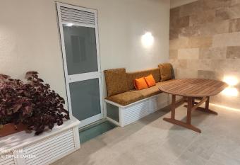 Aquamarine Sea Front Apartments - Elevated Ground Floor With Balcony And Yard has Balcony rooms