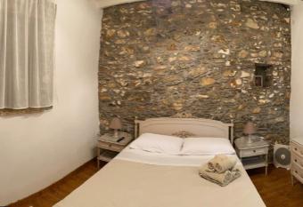 Traditional stone house has Balcony rooms