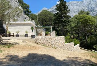 Holiday Home Nugal Makarska 2+2 has rooms with a private hot tub