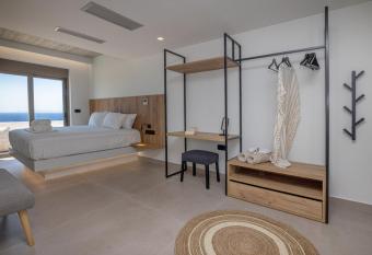 Blue Gres Villa Tinos has rooms with a private hot tub