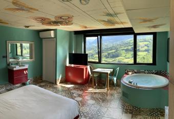 LA ALDEA SO  ADA has rooms with a private hot tub