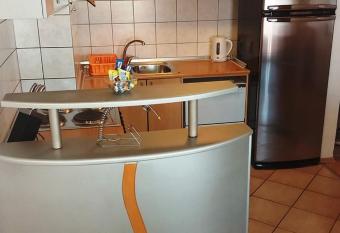 Cozy Two Bedroom Apartment 8 has rooms with a private hot tub