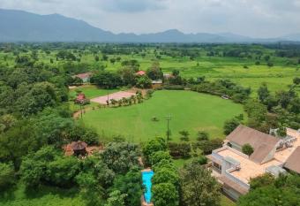 Nivaant Farms & Cottages - Nestled in lush greenery, offering a Swimming pool, Orchard, Jacuzzi & A spacious lawn with gazebo allows 18 year olds to book a room