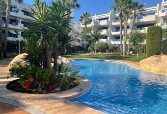 Coral House - La Calma - Playa Flamenca - big terrace & 4 Swimming pools. allows 18 year olds to book a room
