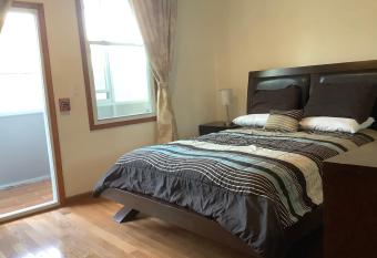 StaySimpler Loft District Spacious Master Bdrm with Private Bath and Sun Deck allows 18 year olds to book a room