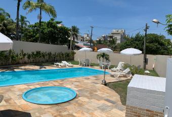 Lindo Studio proximo a praia da Enseada allows 18 year olds to book a room