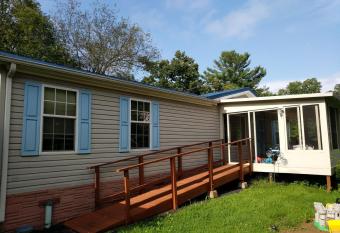 Thomas Holiday Home has rooms with a private hot tub