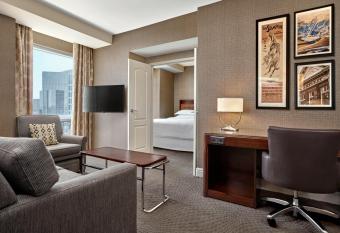 Sheraton Suites Calgary Eau Claire allows 18 year olds to book a room