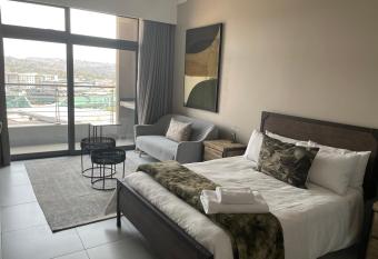 Unit 1312 Menlyn Maine Residence allows 18 year olds to book a room