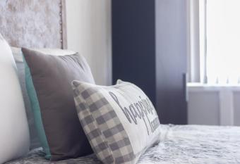 Bright Stylish Condo a Block Away From The Beach has Balcony rooms