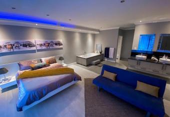 The Penthouse has rooms with a private hot tub