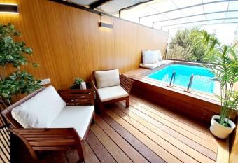                        -                        has rooms with a private hot tub