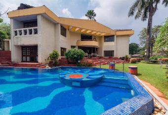 StayVista s Shantam House - Dive into relaxation with a pool and tennis lawn allows 18 year olds to book a room