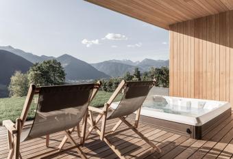 Santre dolomythic home has rooms with a private hot tub