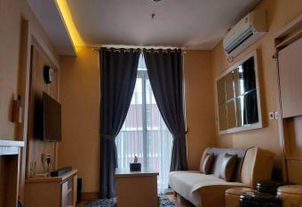 Apt Pejaten Park 1 BR Brown with Netflix, DisneyHot & Swimming Pool has Balcony rooms