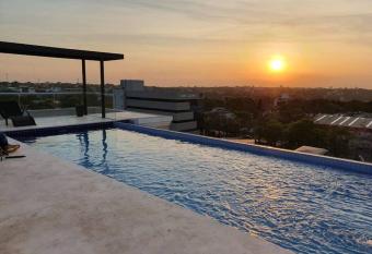 Hermoso departamento con piscina y estacionamiento allows 18 year olds to book a room