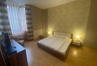 Flora Hotel Apartment 103 has rooms with a private hot tub