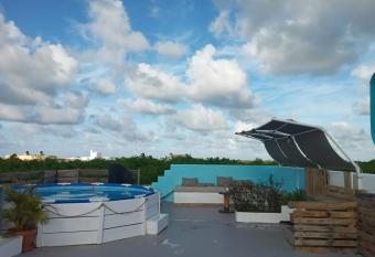 Dominican Dream Apartments has rooms with a private hot tub