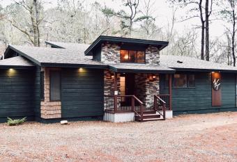 Wine Time 5 Bedroom Shuffleboard Hot Tub Fire Pit Play Set has rooms with a private hot tub