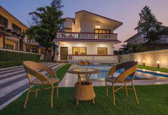 StayVista s Brookvale Cottage - Dive into tranquility with pool view and gazebo allows 18 year olds to book a room