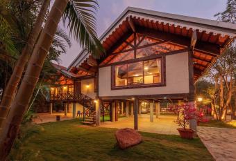 Aranyam Villa by StayVista with Modern wooden interiors, Kidszone, Indoor games & plunge pool allows 18 year olds to book a room