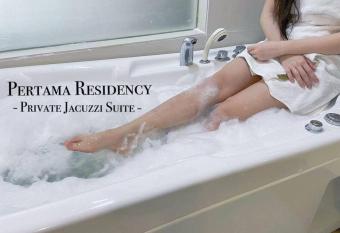 Private Jacuzzi Staycation at KL City 721 has rooms with a private hot tub