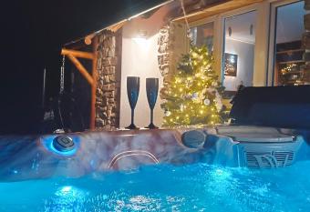 Chalet d  amour has rooms with a private hot tub