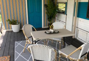 Crescent Head, stylish retro caravan, deck, bathroom, private bush setting near beach has Balcony rooms