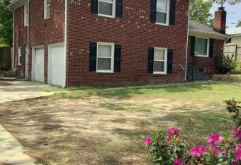 4-bedroom brick home with a full kitchen, king size bed and all the space you need for you and your large family on your getaway. allows 18 year olds to book a room