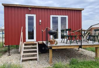 Tiny House has Balcony rooms