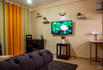 STYLISH 1BR APARTMENT IN KISUMU: FAST WI-FI, NETFLIX, SECURE PARKING allows 18 year olds to book a room