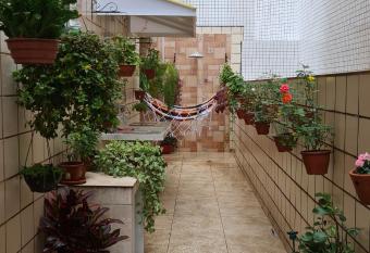 Lazer Aconchegante na Guilhermina has Balcony rooms