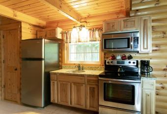 Sugar Maple Cabin by Amish Country Lodging has Balcony rooms