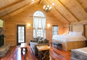 Whispering Pines Treehouse by Amish Country Lodging has Balcony rooms