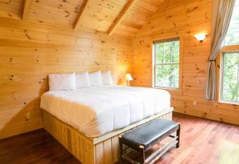 Wild Cherry Treehouse by Amish Country Lodging has Balcony rooms