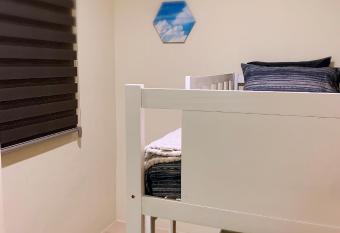 Aries Homestay has rooms with a private hot tub