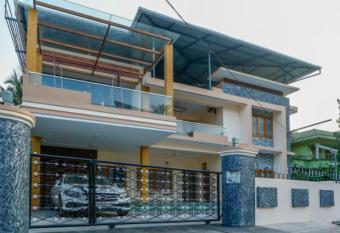 Belljem Homes -your own private resort -2 BHK GF has rooms with a private hot tub