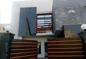 Book Room & Stay Comfort Manage 2 property In Karachi has Balcony rooms