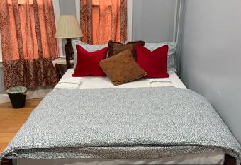 A Spacious Room in Queens allows 18 year olds to book a room