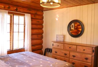Historic Log Cabin #14 at Horse Creek Resort has Balcony rooms