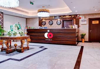 Capital O 605 Tafwij Hotel has rooms with a private hot tub
