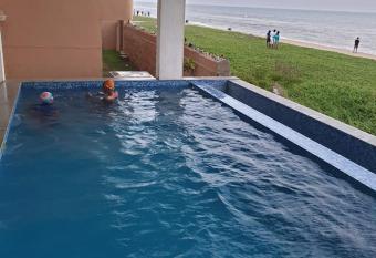 ECR BEACH HOUSE GUEST HOUSE WITH SWIMMING POOL has Balcony rooms