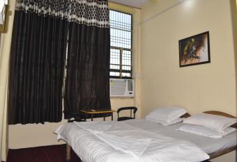 OM REST HOUSE has Balcony rooms