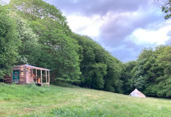 Remote Cabin & 3 Giant Tents Retreat has Balcony rooms