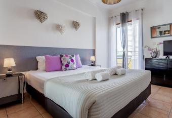 Light & Comfy Apartment W/ Pool & Balcony by LovelyStay has Balcony rooms