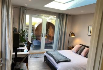 Contemporary guest house with outside barrel sauna has Balcony rooms