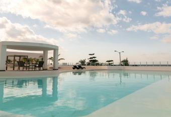 Confortable casa en Cozumel, Condominio con alberca y vista al mar has Balcony rooms